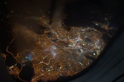 Close-up of illuminated lighting equipment at night