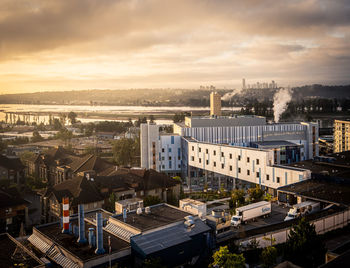 High angle view of buildings in city against sky