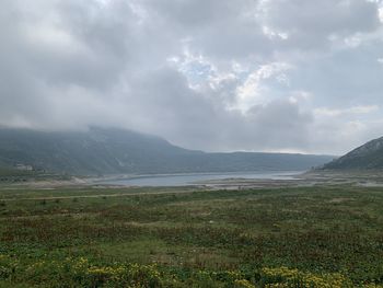 Scenic view of land against sky