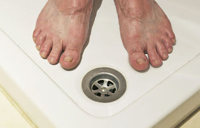 Low section of man in bathroom