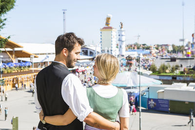 Rear view of couple at oktoberfest