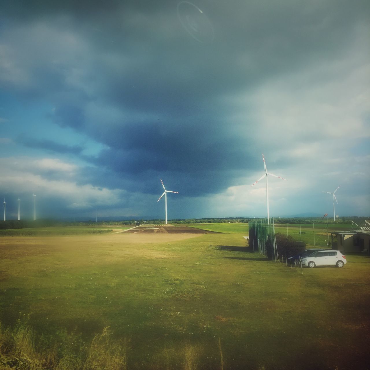 wind turbine, environmental conservation, renewable energy, alternative energy, fuel and power generation, wind power, windmill, rural scene, environment, landscape, field, sustainable resources, scenics, grass, power in nature, nature, tranquil scene, tranquility, farm, industrial windmill, sky, cloud - sky, beauty in nature, agriculture, outdoors, day, grass area, green color, non-urban scene