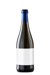 Glass of bottle against white background
