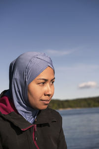 Woman wearing hijab looking away
