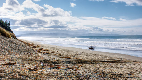 Scenic view of beach against sky