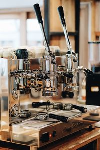 Close-up of espresso maker in cafe