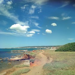 Scenic view of beach against sky