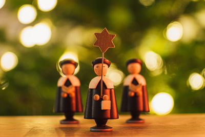 Close-up of figurines on table