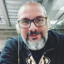 Portrait of man wearing eyeglasses