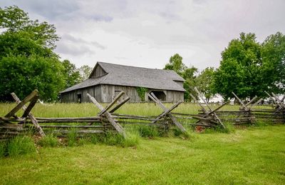 House on field against sky