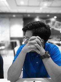 Young man looking at camera