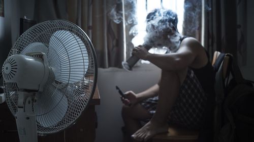 View of a man smoking