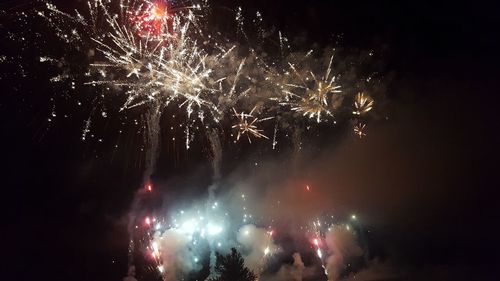 Low angle view of firework display