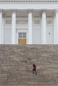 People on staircase of building