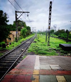 Railroad tracks against sky