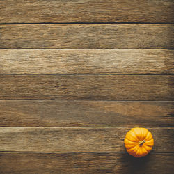 High angle view of pumpkin on wooden table