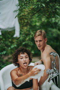 Portrait of a smiling young couple