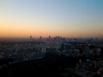 High angle view of cityscape against sky during sunset