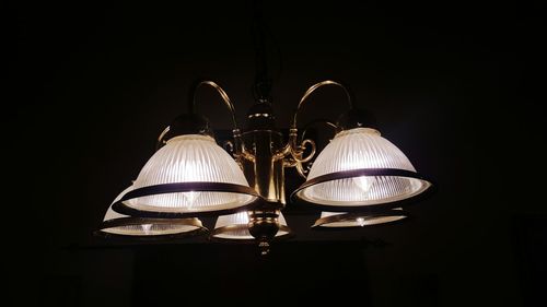 Illuminated pendant lights in darkroom