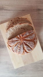 High angle view of bread on cutting board