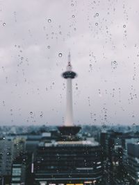 Water drops on fountain in city