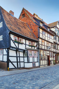 Sstreet with historical half-timbered houses in quedlinburg, germany