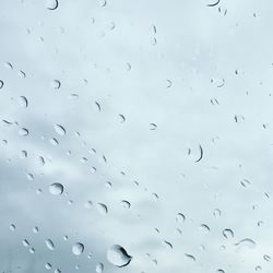 Close-up of water drops on glass