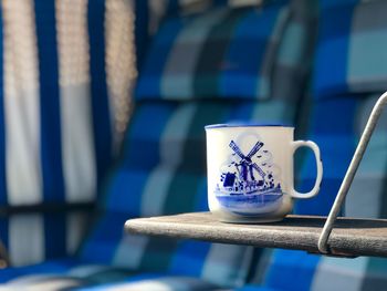 Close-up of coffee cup on table