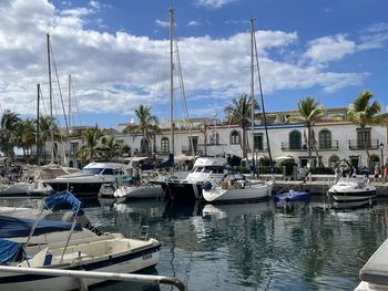 Boats moored at harbor