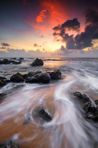 Scenic view of sea against sky during sunset