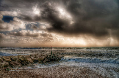 Scenic view of sea against sky during sunset