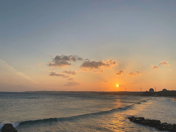 Scenic view of sea against sky during sunset