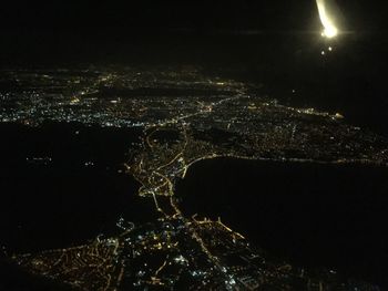 Illuminated cityscape at night