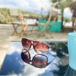 Close-up of sunglasses on table 