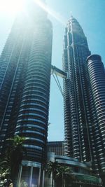 Low angle view of skyscrapers against sky