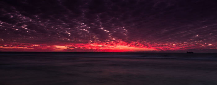 Scenic view of sea against sky at night