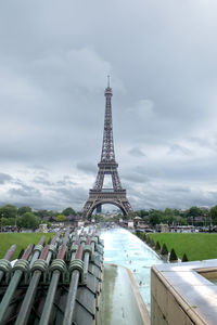 View of tower against cloudy sky