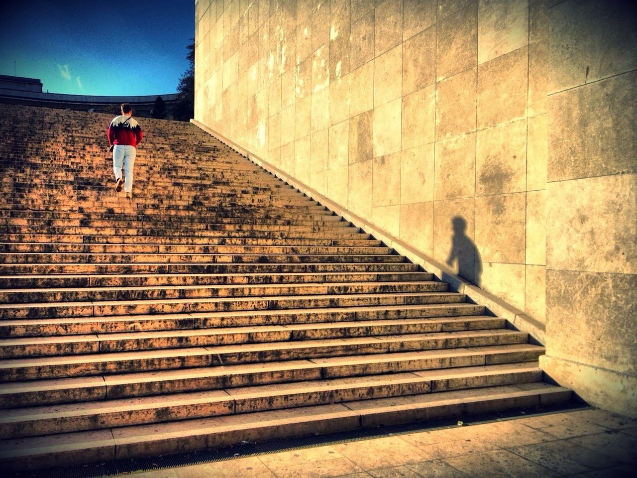 steps, steps and staircases, architecture, built structure, staircase, building exterior, the way forward, wall - building feature, walking, stairs, full length, railing, men, lifestyles, brick wall, low angle view, outdoors, auto post production filter