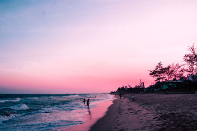 Scenic view of sea against sky at sunset