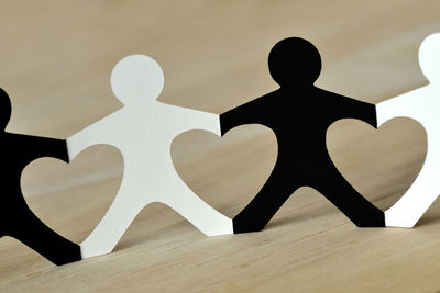 High angle view of cross on table