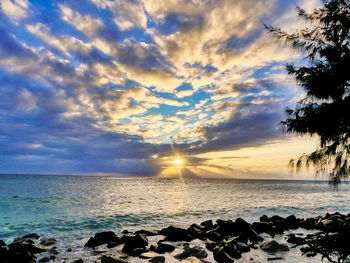 Scenic view of sea against sky during sunset