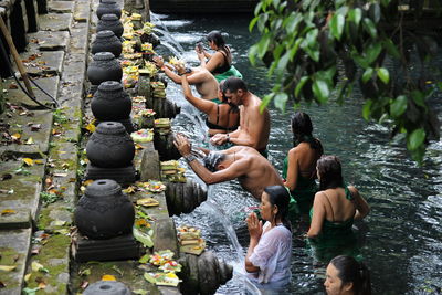 Group of people sitting in temple