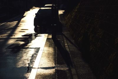 Close-up of shadow on road