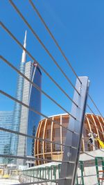 Low angle view of built structure against blue sky