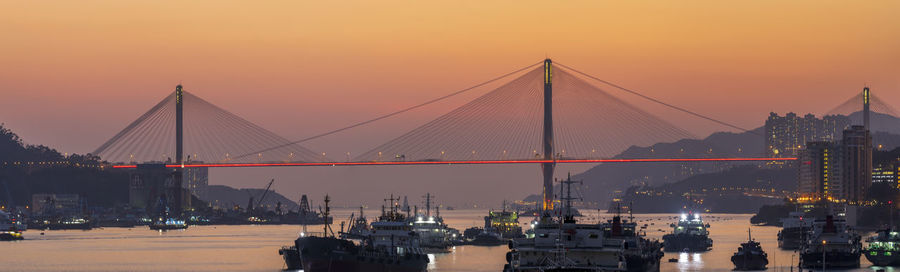 View of suspension bridge at sunset