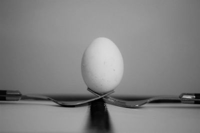 Surface level shot of egg on forks
