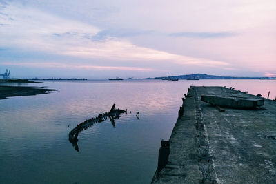 Scenic view of sea against sky during sunset