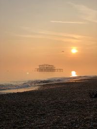 Scenic view of sunset over sea