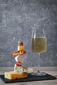 Concept equilibrium floating food and white wine glass