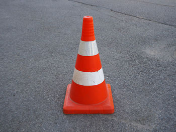 High angle view of arrow sign on road